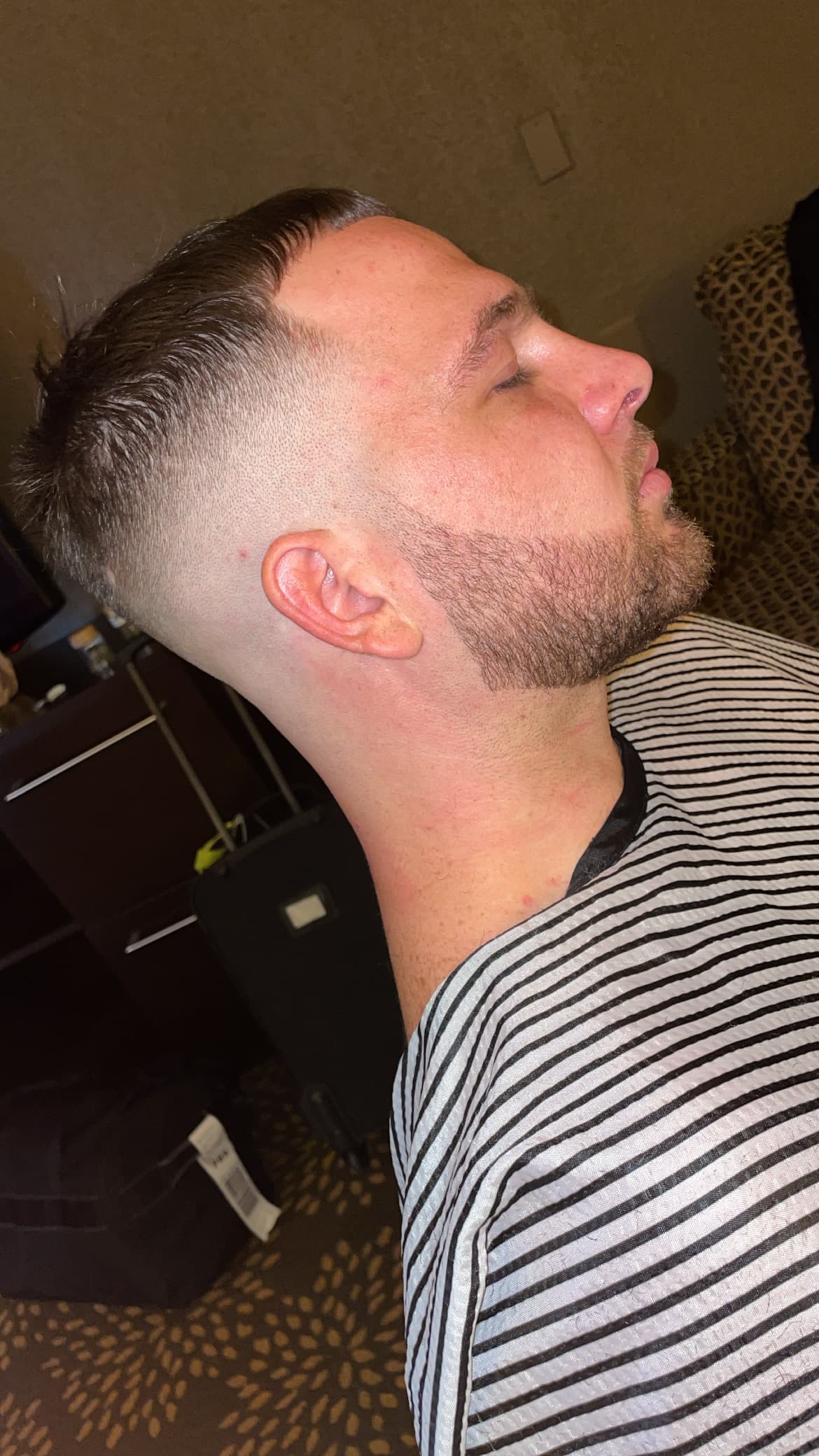 Skin fade with styled top by Buck Xperience